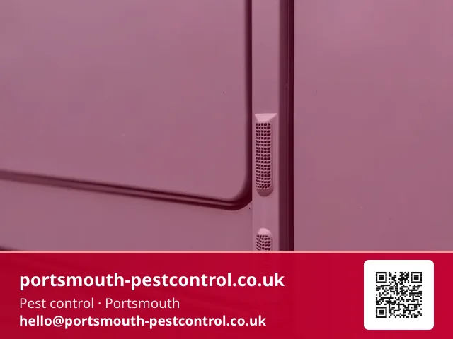 Brush seal at a retail unit's rear loading door