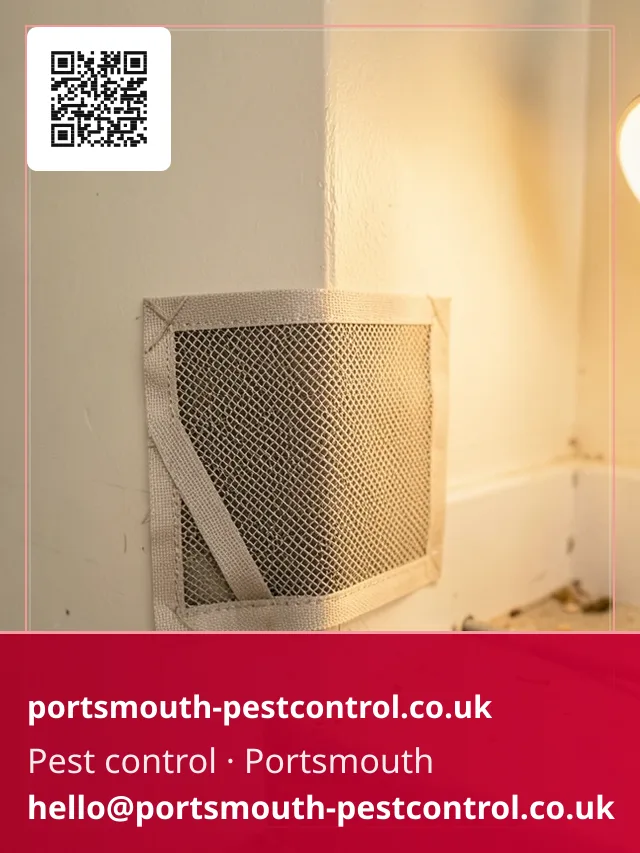 Mesh proofing patch being fitted at a garage floor-to-wall junction
