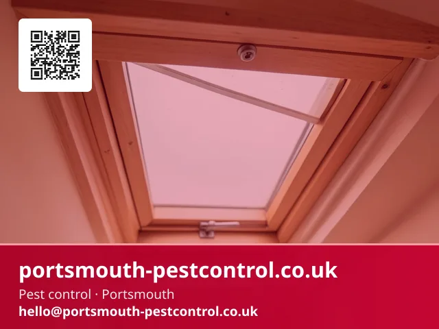 Foam draught seal being fitted around a loft hatch frame