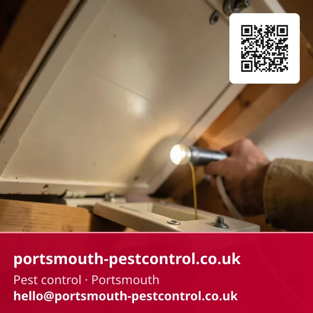 Small bait point being placed just inside an open loft hatch opening