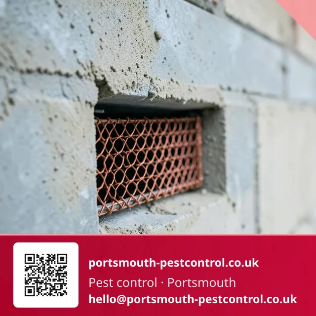 Copper mesh being fitted into a cavity wall weep vent