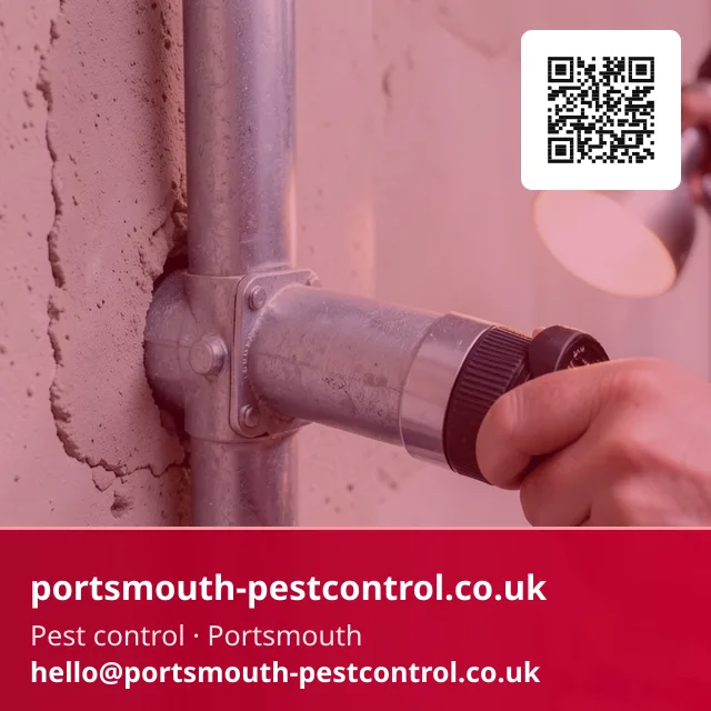 Proofing collar being fitted around a service pipe penetration through an exterior wall